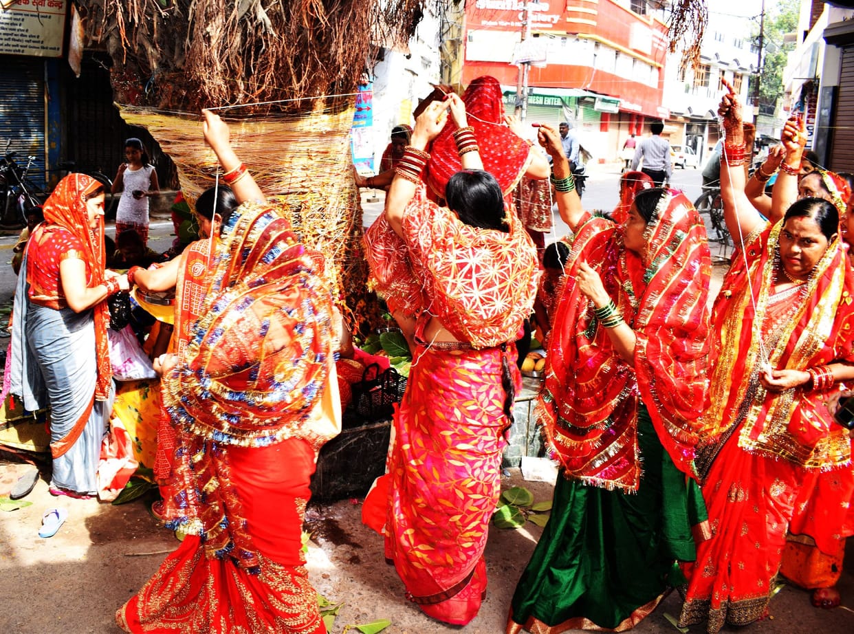 Worshiping the banyan tree and seeking blessings of husband's longevity