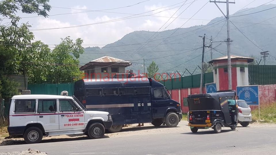 Kashmir Security forces deployed outside the colonies of Kashmiri Pandits said being stopped to protest many migrant employees returned to Jammu