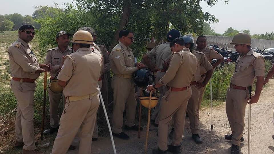 Bulldozer ran on school of former  Municipal President in etah