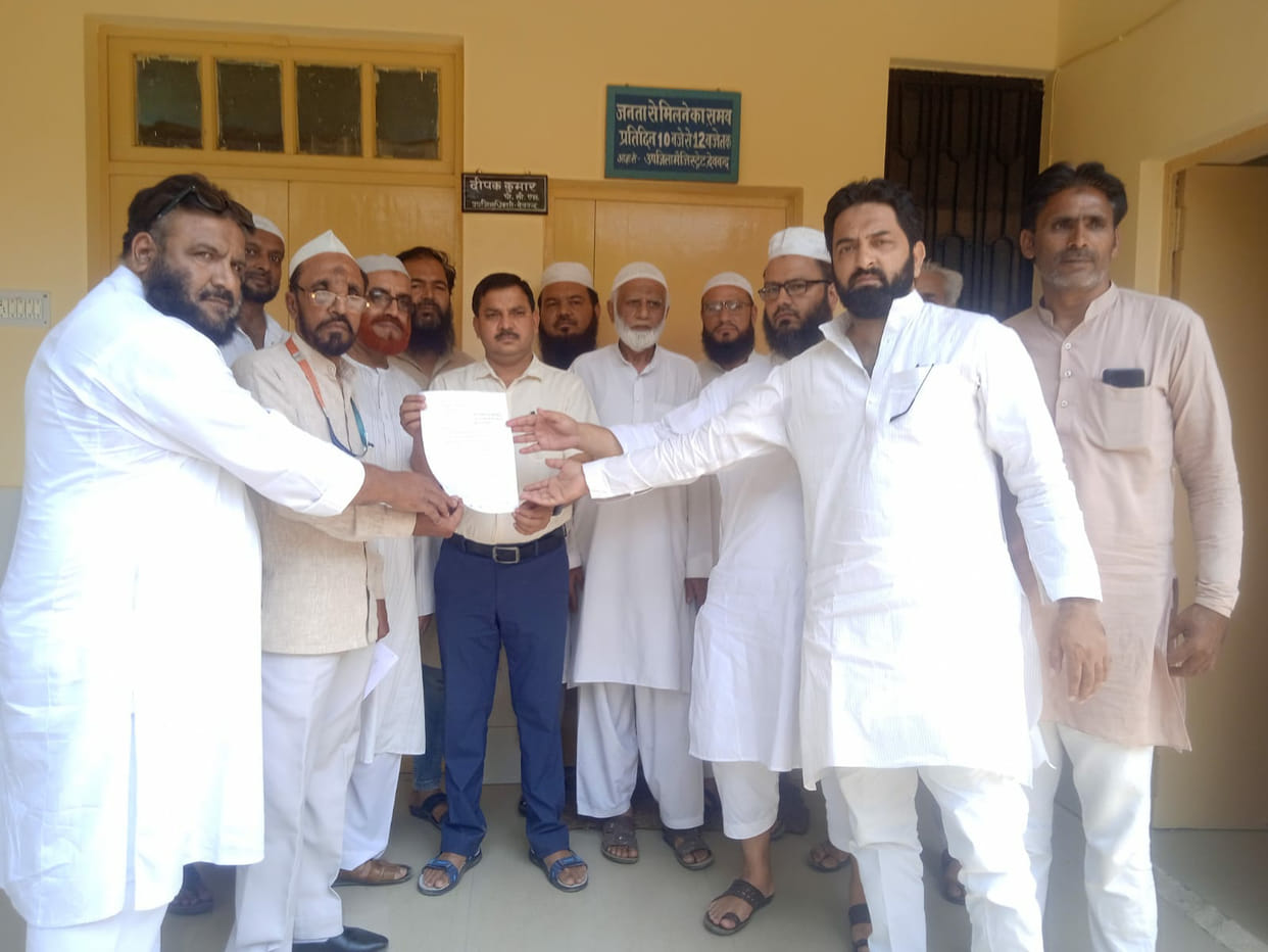 Accused of attempting to take possession of mosque property