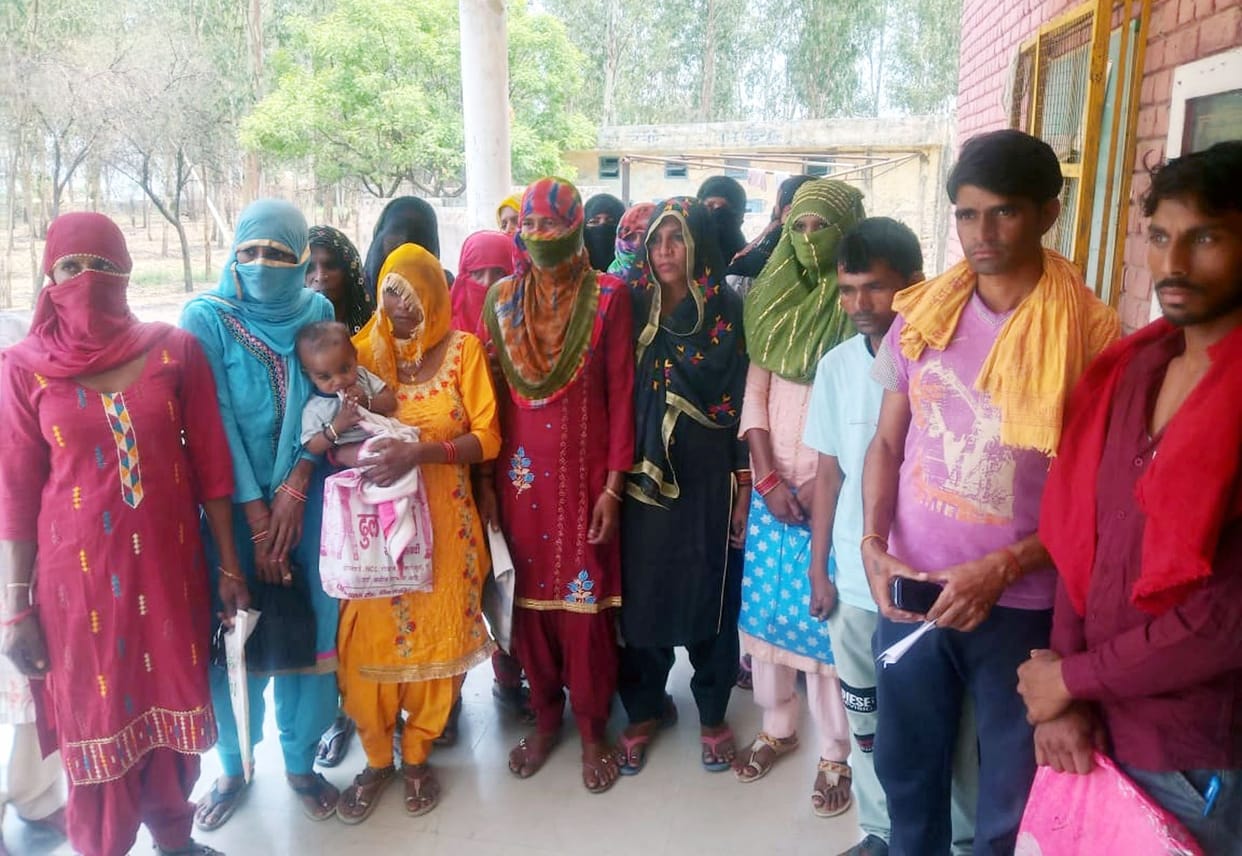 Demonstration alleging discrimination in housing scheme