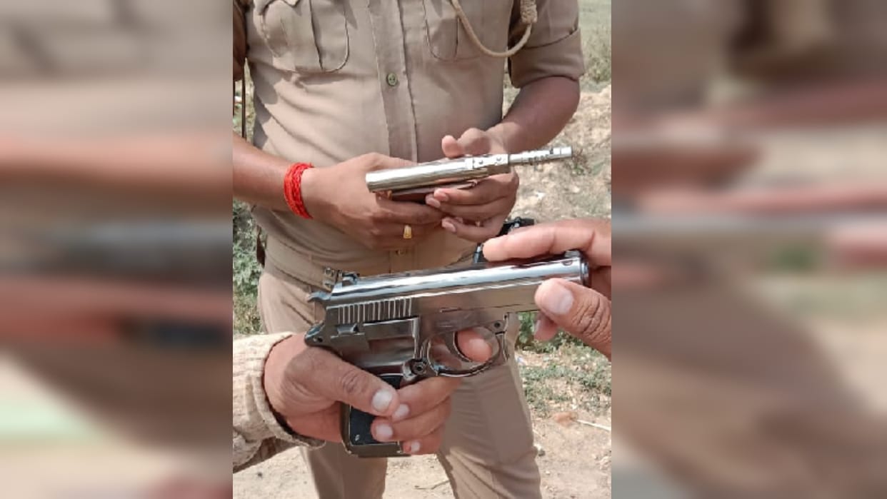 toy Pistol and firearm found in garbage