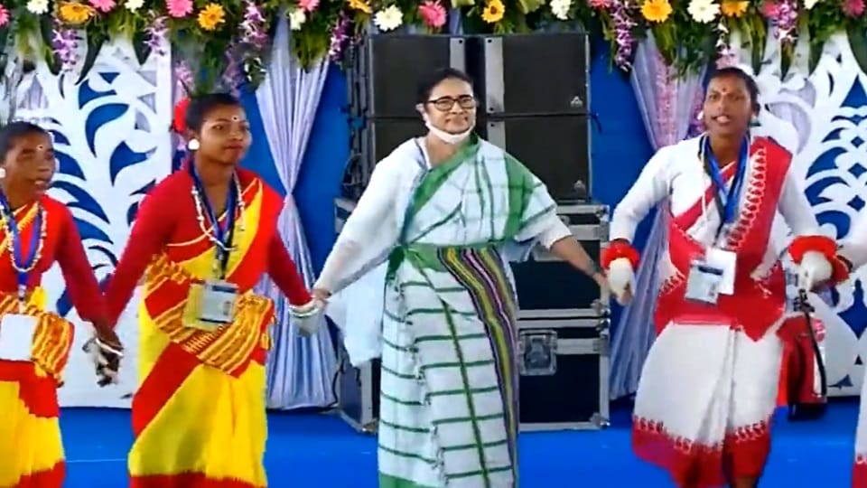 West Bengal CM Mamata Banerjee dances with folk artists at mass wedding ceremony