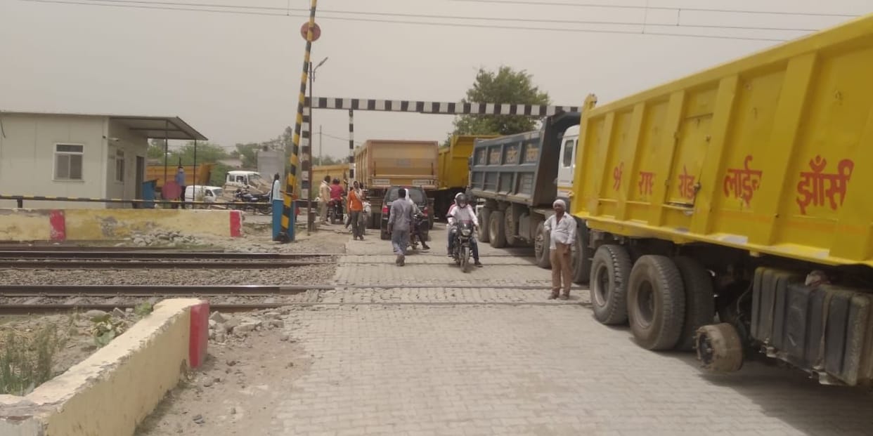 Dumper stuck at the crossing, jammed
