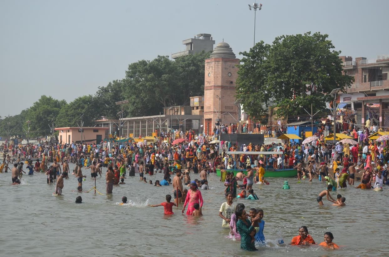 Flood of reverence, took a dip of faith in the Ganges