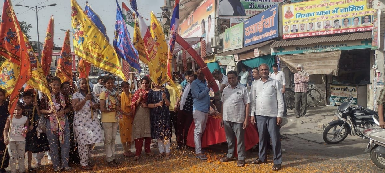 Devotees dance in Shree Shyam Nishan Yatra
