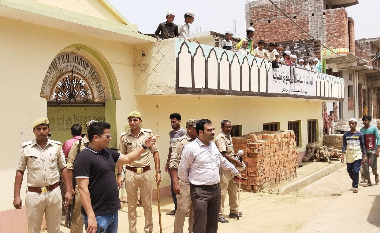 Friday prayers under police guard