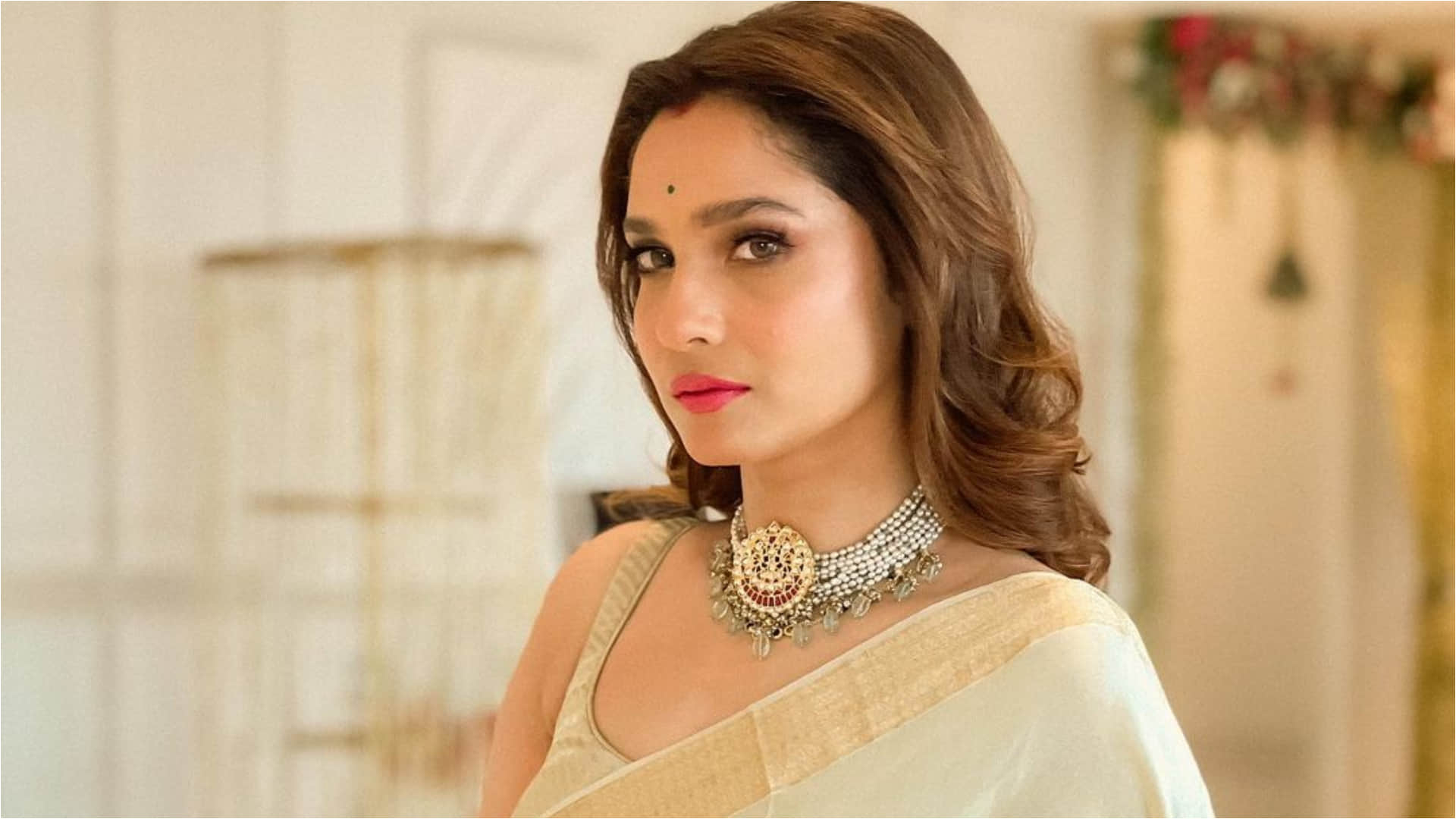 ankita lokhande looks beautiful in ivory silk saree with hubby vicky jain