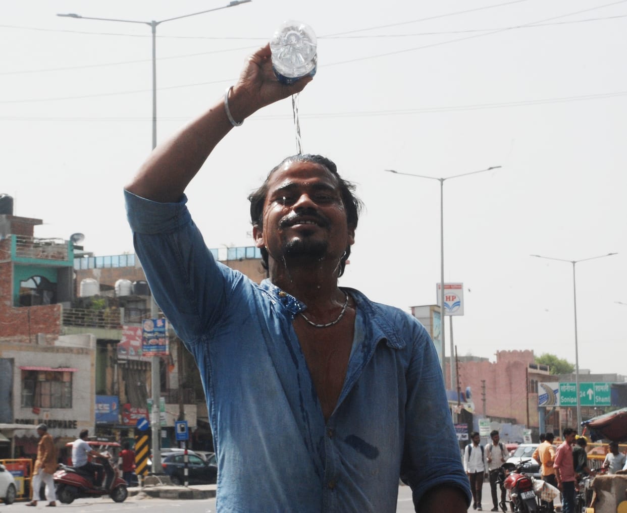 People getting hot in summer, suffering from heat