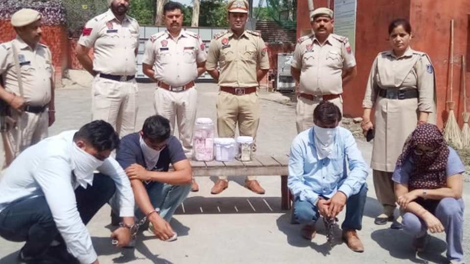 Pathankot police arrested four people with fake currency