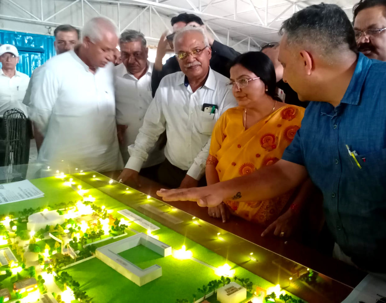 The minister got angry due to the slow pace of the construction of the university.