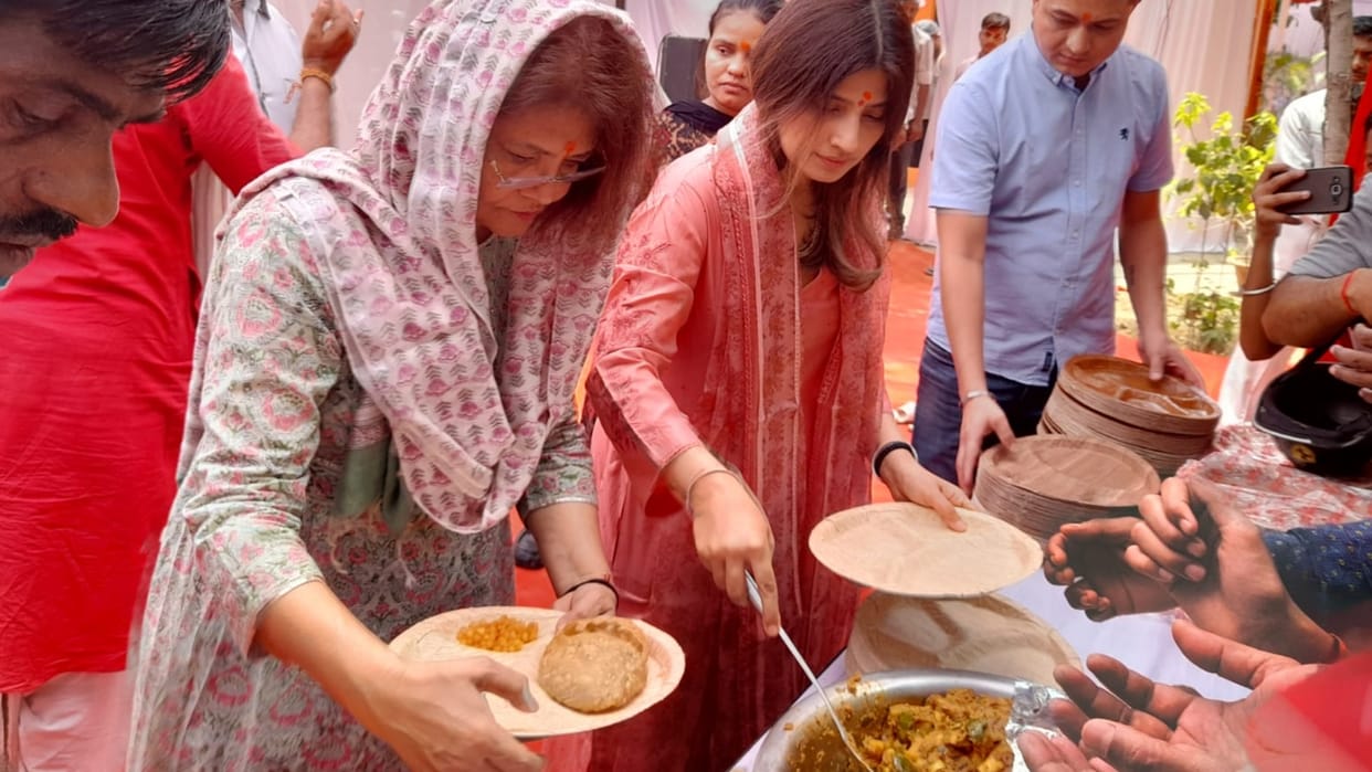 Dimple yadav distribute food on bada mangal.