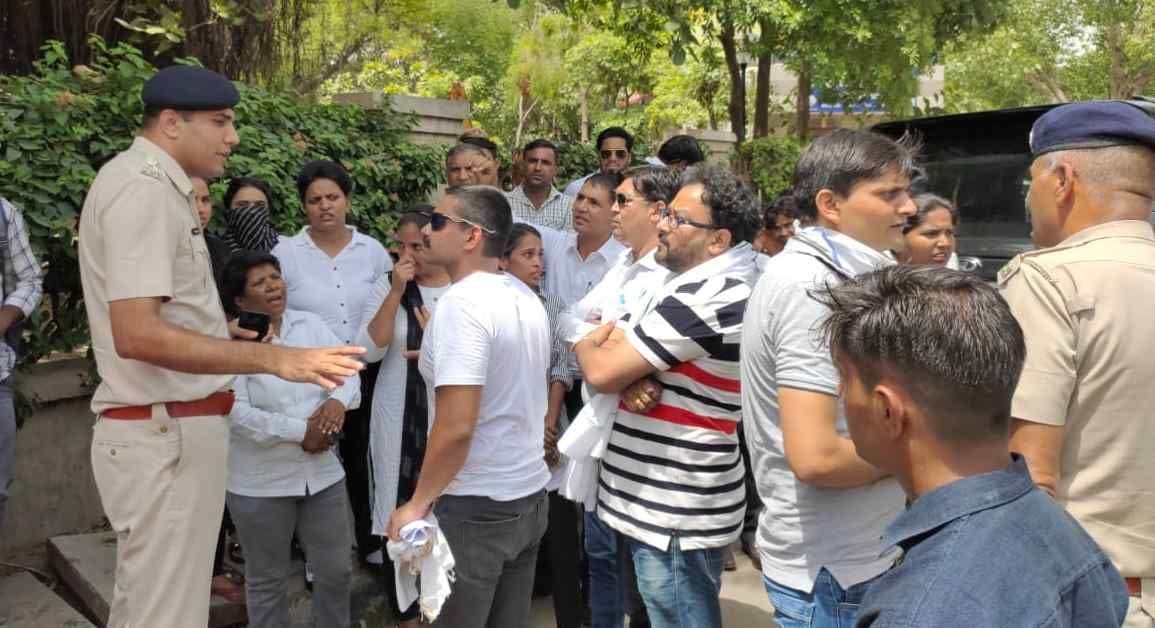 Lawyers jammed the court complex chowk, demanding protection to the female lawyer