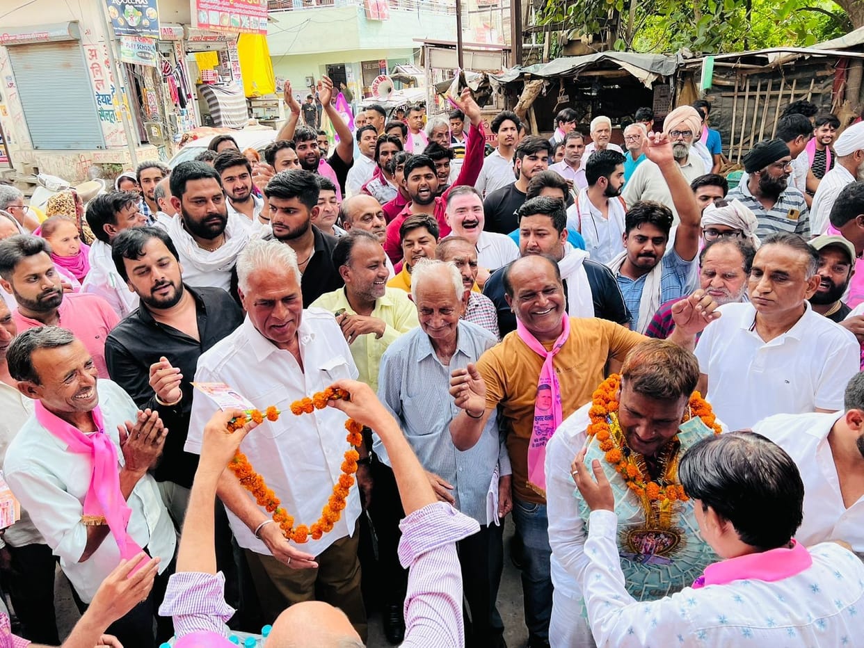 Public relations campaign... candidates are making every effort to woo the disgruntled workers at the door of the traders