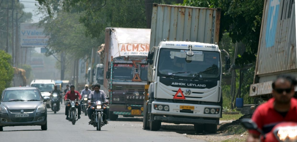 Trucks standing on the road defying the orders of the Chief Minister