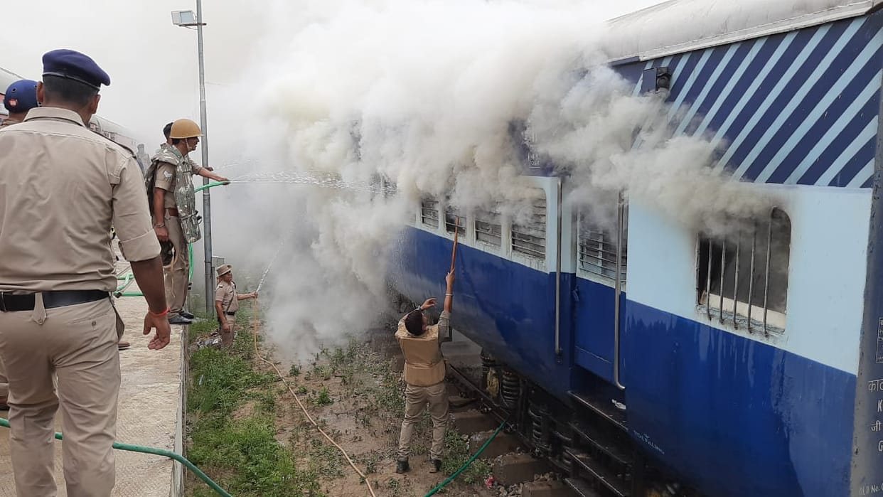 Train bogie set on fire, vandalized, stone pelted