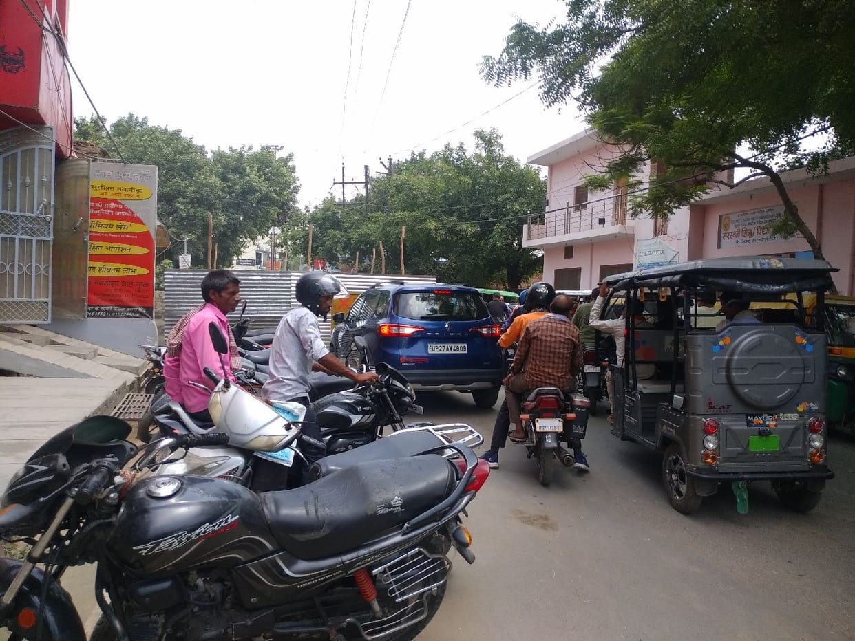 Shopkeepers and handcarts again surrounded the roads