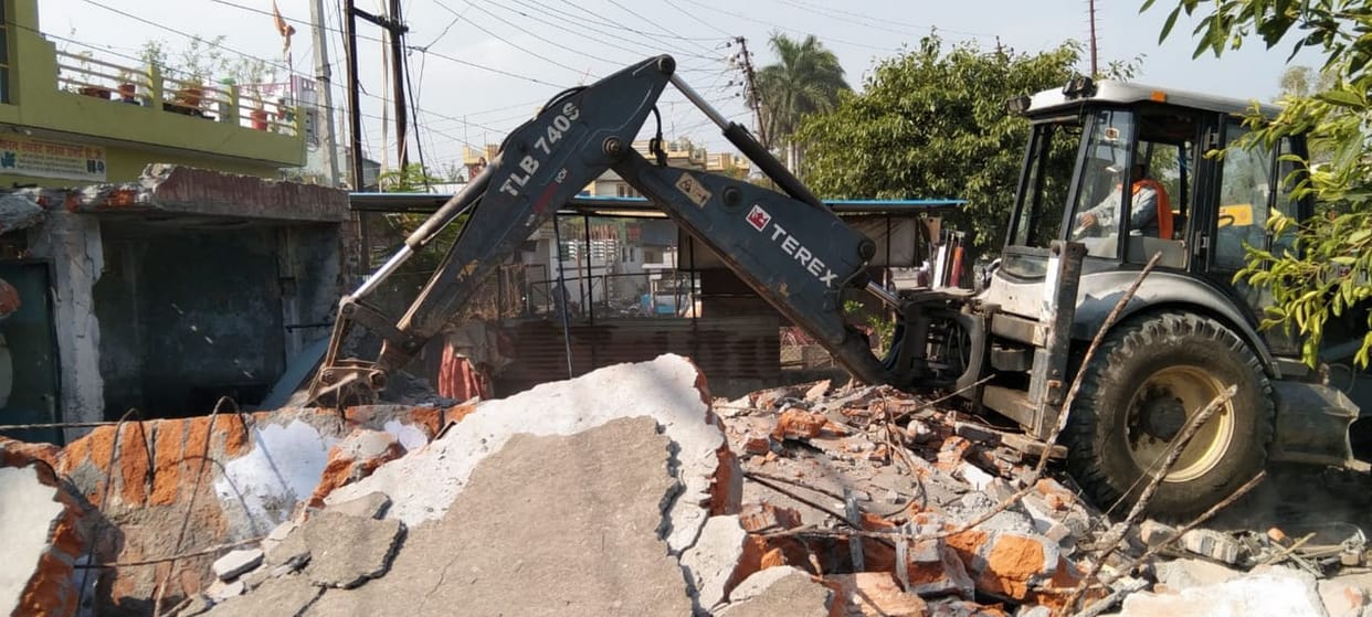 The old toilet near the railway station was demolished with JCB