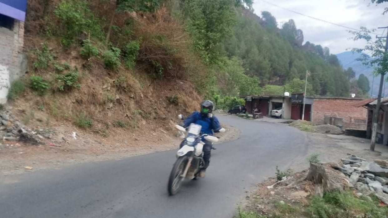 Rally of Chamba bikes and sports car rider on an altitude of 14 thousand feet