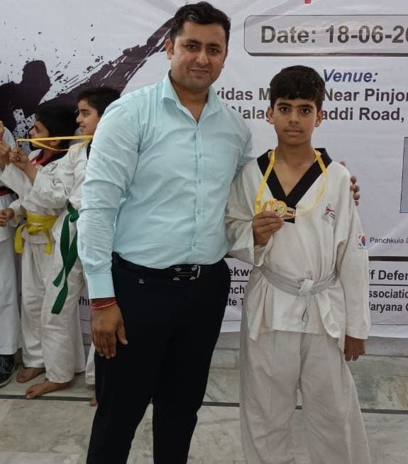 Devam won gold medal in Taekwondo