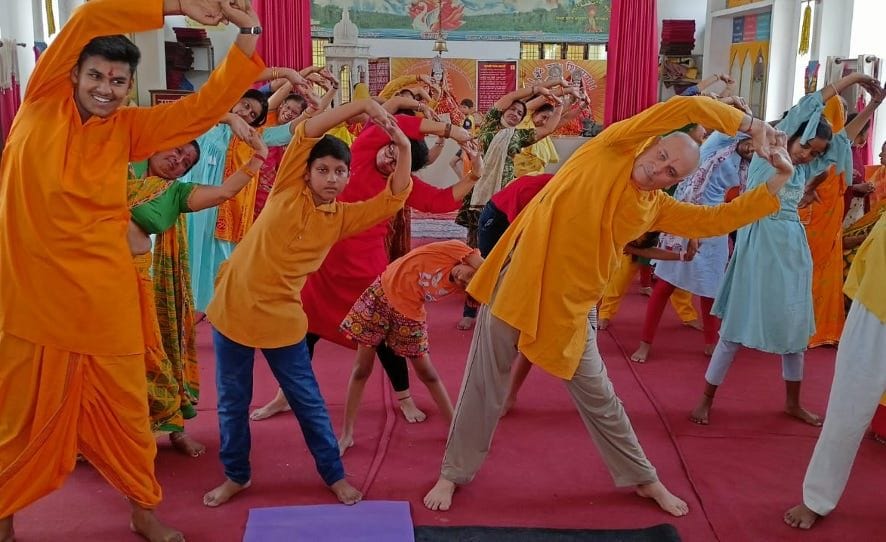 Yoga instructors engaged in preparations for World Yoga Day