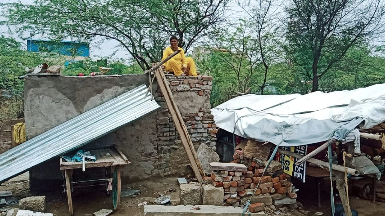 Due to the rain in Ajmer the roads were flooded and huts blown up