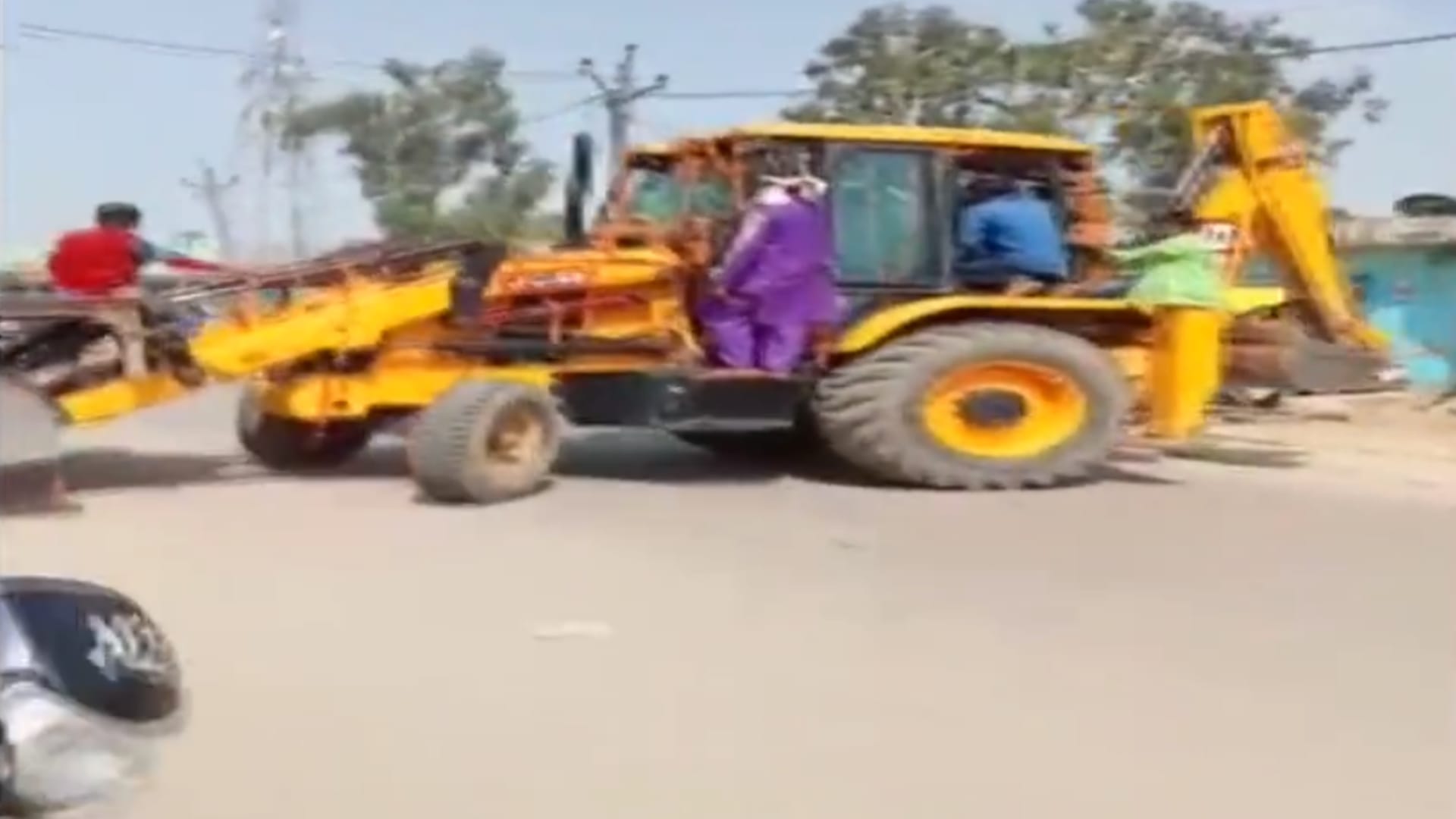 A bridegroom rode a bulldozer to the bride's house in Bahraich.