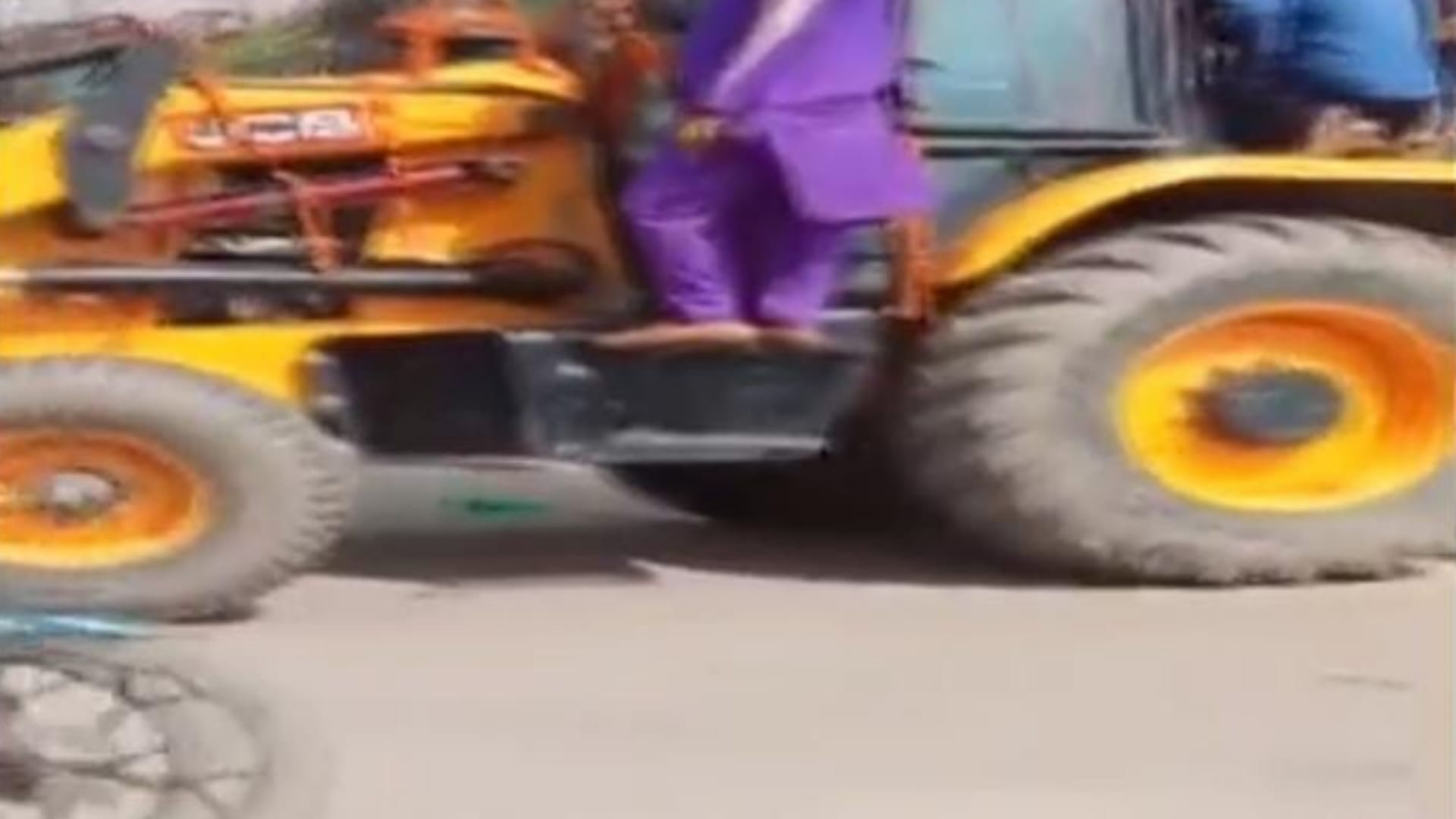 A bridegroom rode a bulldozer to the bride's house in Bahraich.