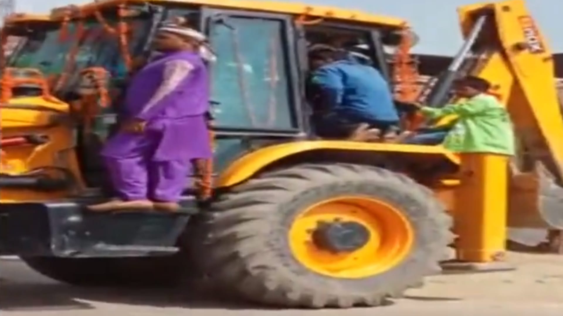 A bridegroom rode a bulldozer to the bride's house in Bahraich.