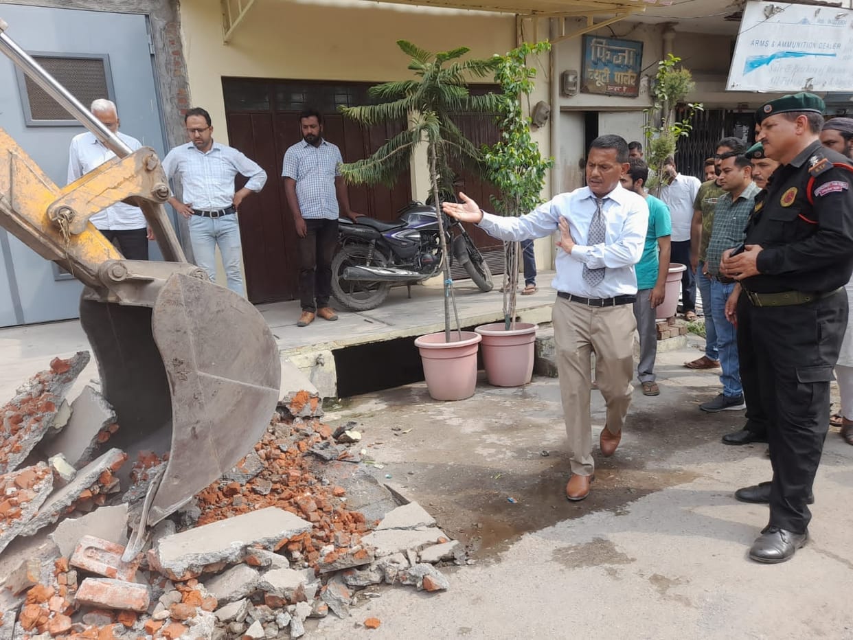 Corporation's bulldozer run on encroachment
