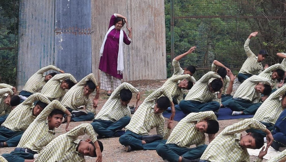 Message given to stay healthy through yoga