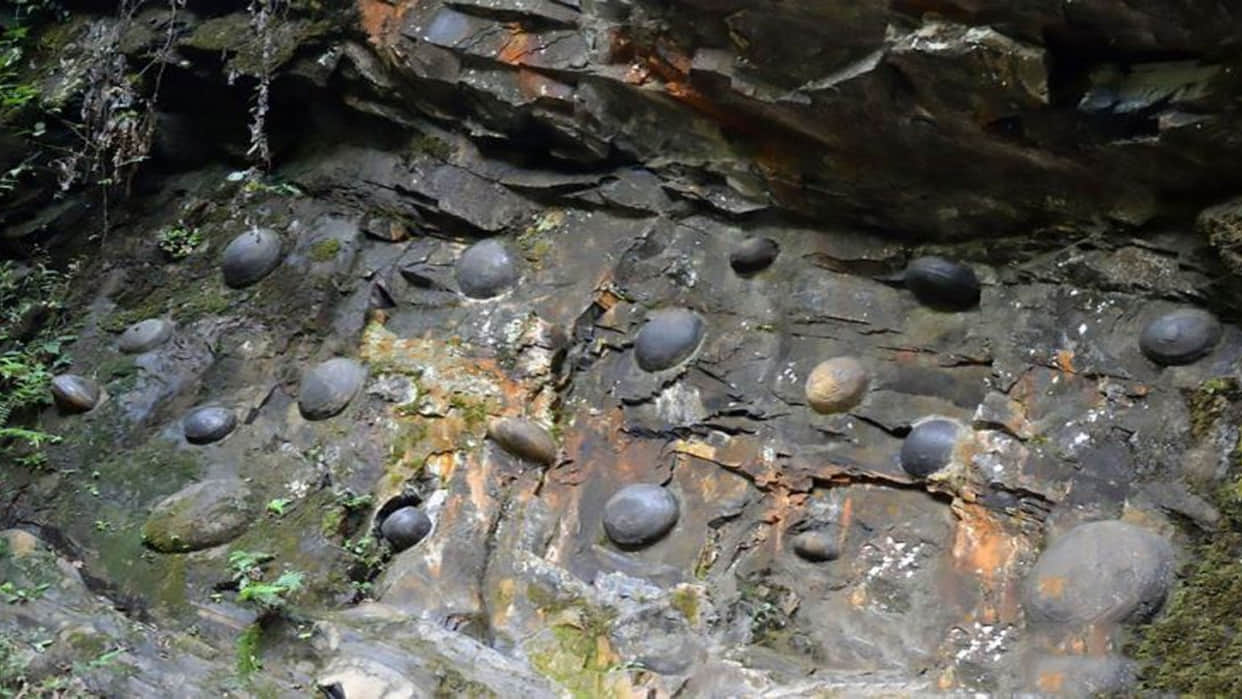 China mysterious cliff that lays egg shaped stones every 30 years in china you would not believe