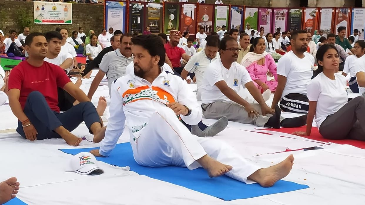 Anurag Thakur and Garg did yoga in the courtyard of the historic fort