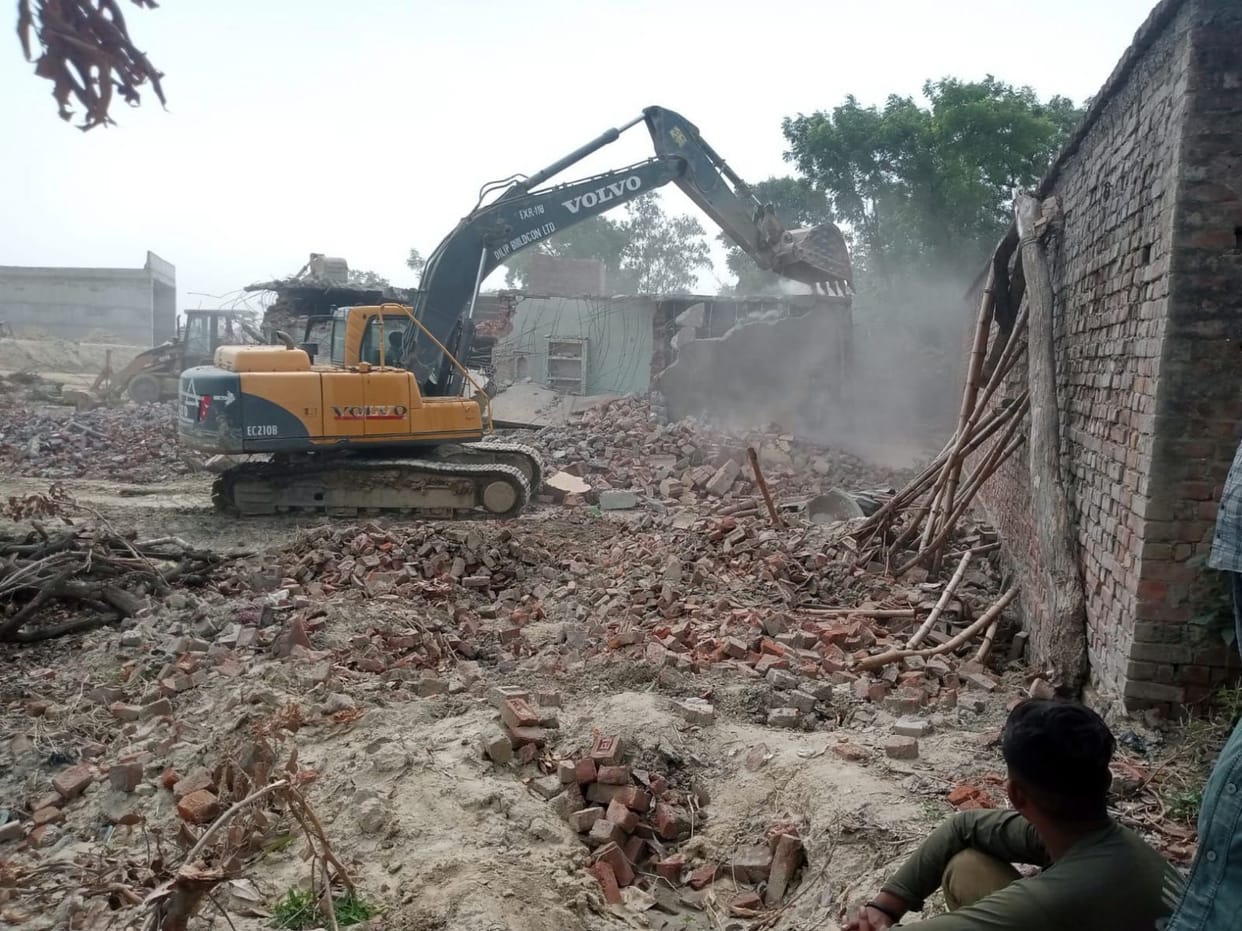 Bulldozers on three buildings that came under acquisition