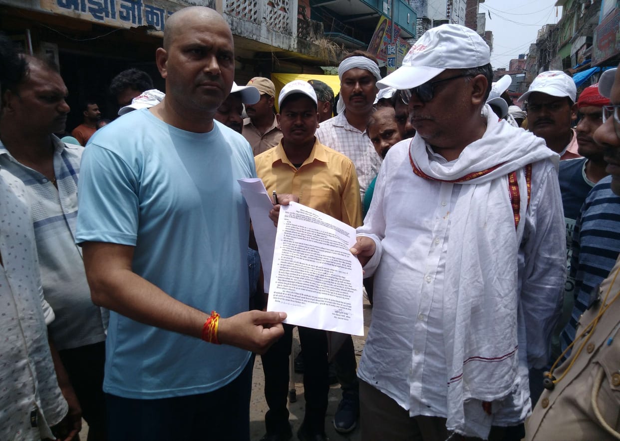 Electricity department is doing meter reading by putting meter on paper itself