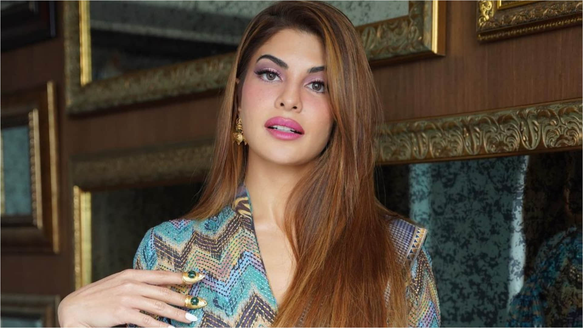 jacqueline fernandez hot look in pink corset top with criss cross detailing with pants