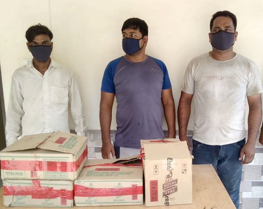 Three arrested with four boxes of illegal English liquor