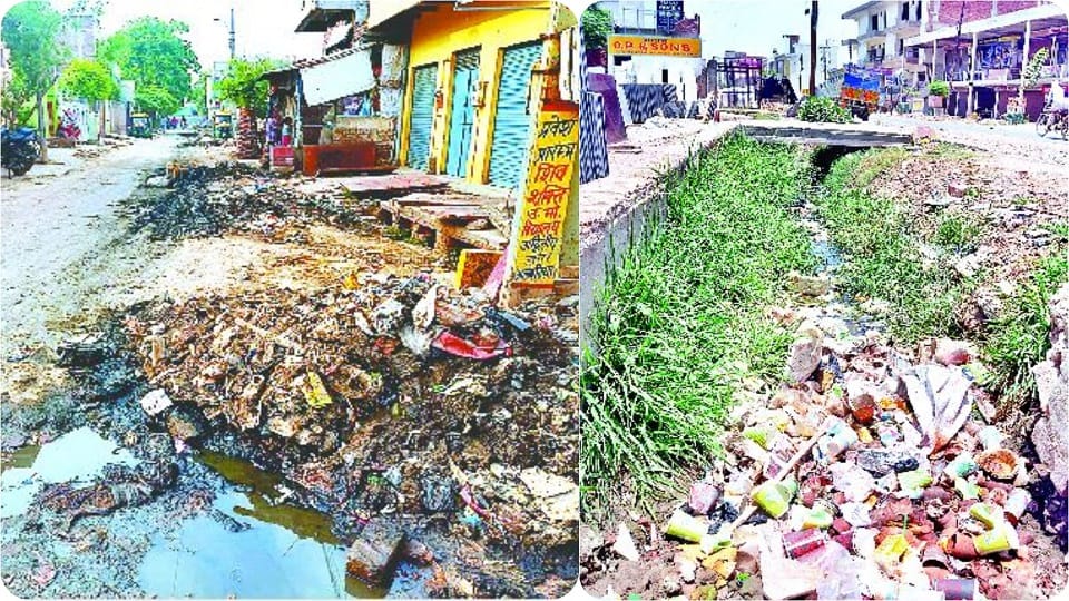 Agra drains are littered with dirt In reality