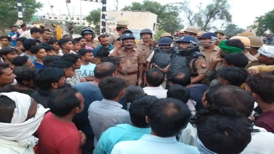 angry villagers stone pelting on police vehicle after women death due to truck collision in etah