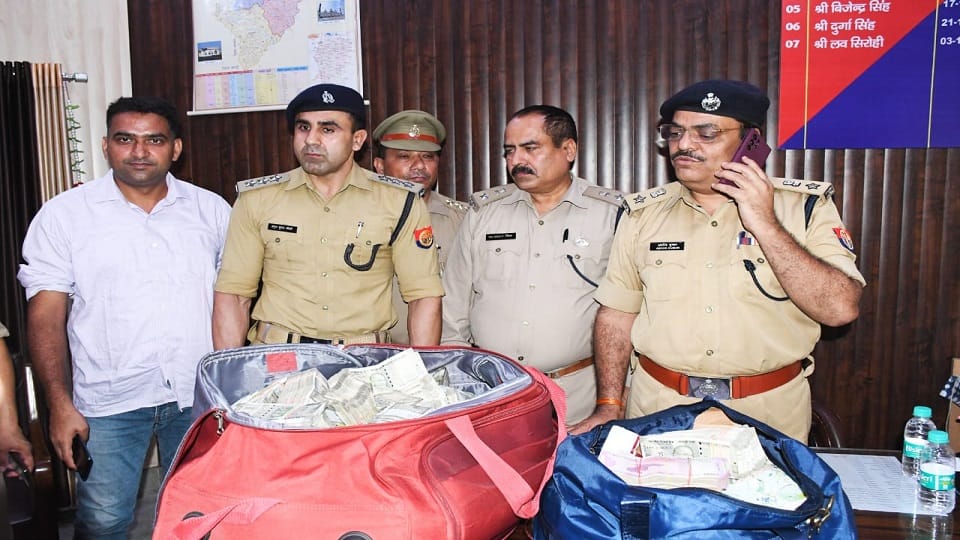 up police took two people into custody with two crore rupees in rampur