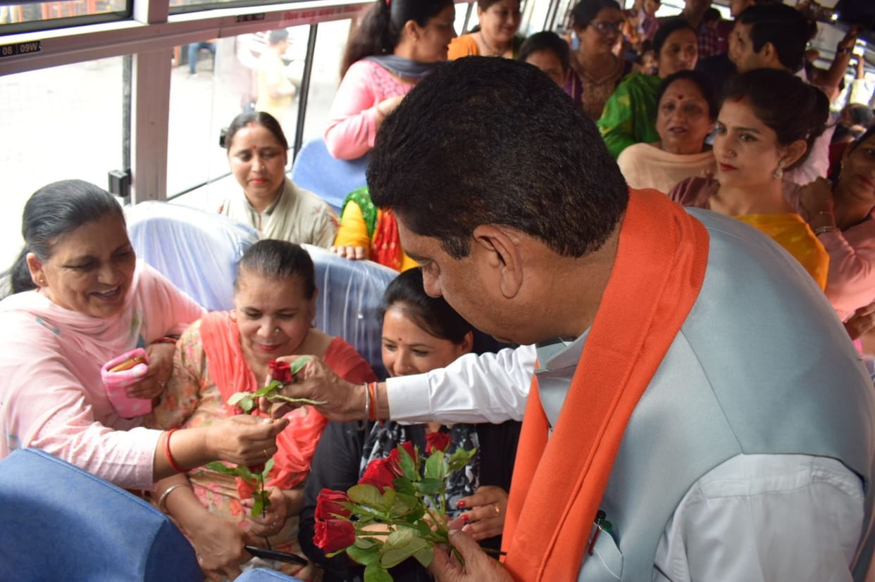 Women honored with flowers in government bus