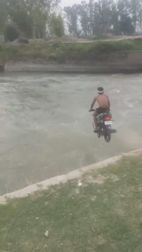 Video of young man jumping with bike in canal goes viral