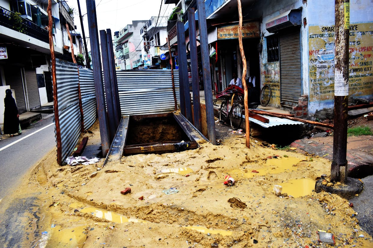 Sewer line work stopped due to rain, jammed