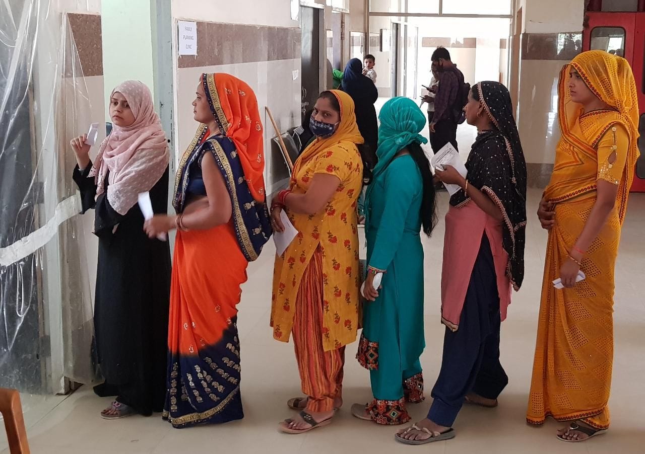 Queues of patients in medical college after rain