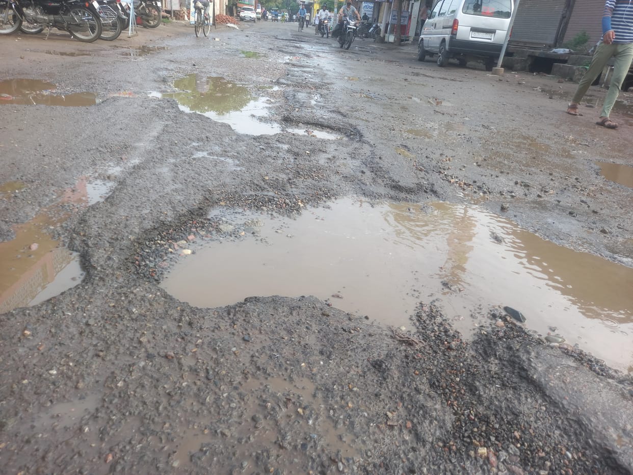 Plenty of potholes in the journey of 150 meters