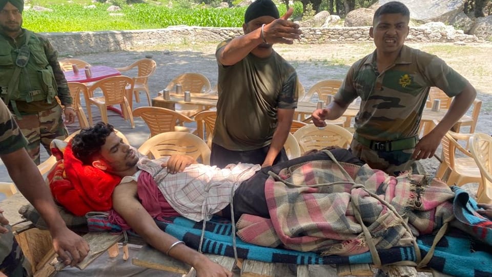 Indian Army evacuated young person across Chenab river who met accident while working in field with tractor in kishtwar