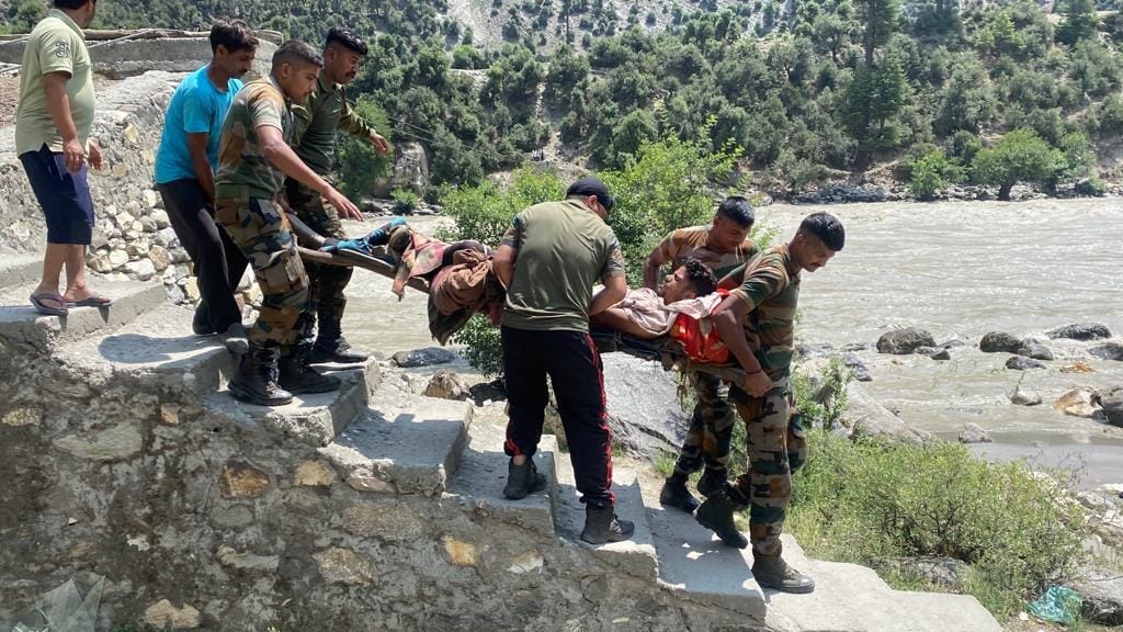 Indian Army evacuated young person across Chenab river who met accident while working in field with tractor in kishtwar