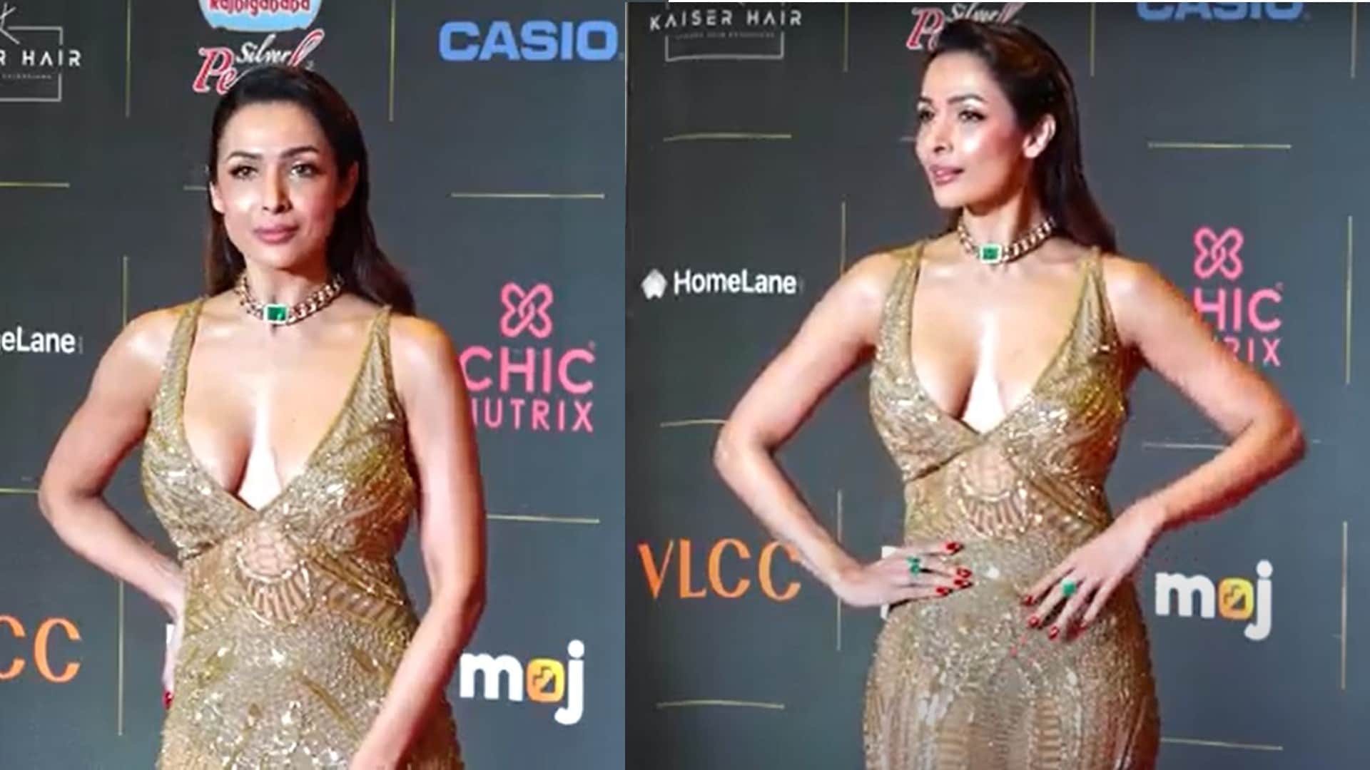 malaika arora looks stunning in white sheer saree for dadasaheb phalke excellence award