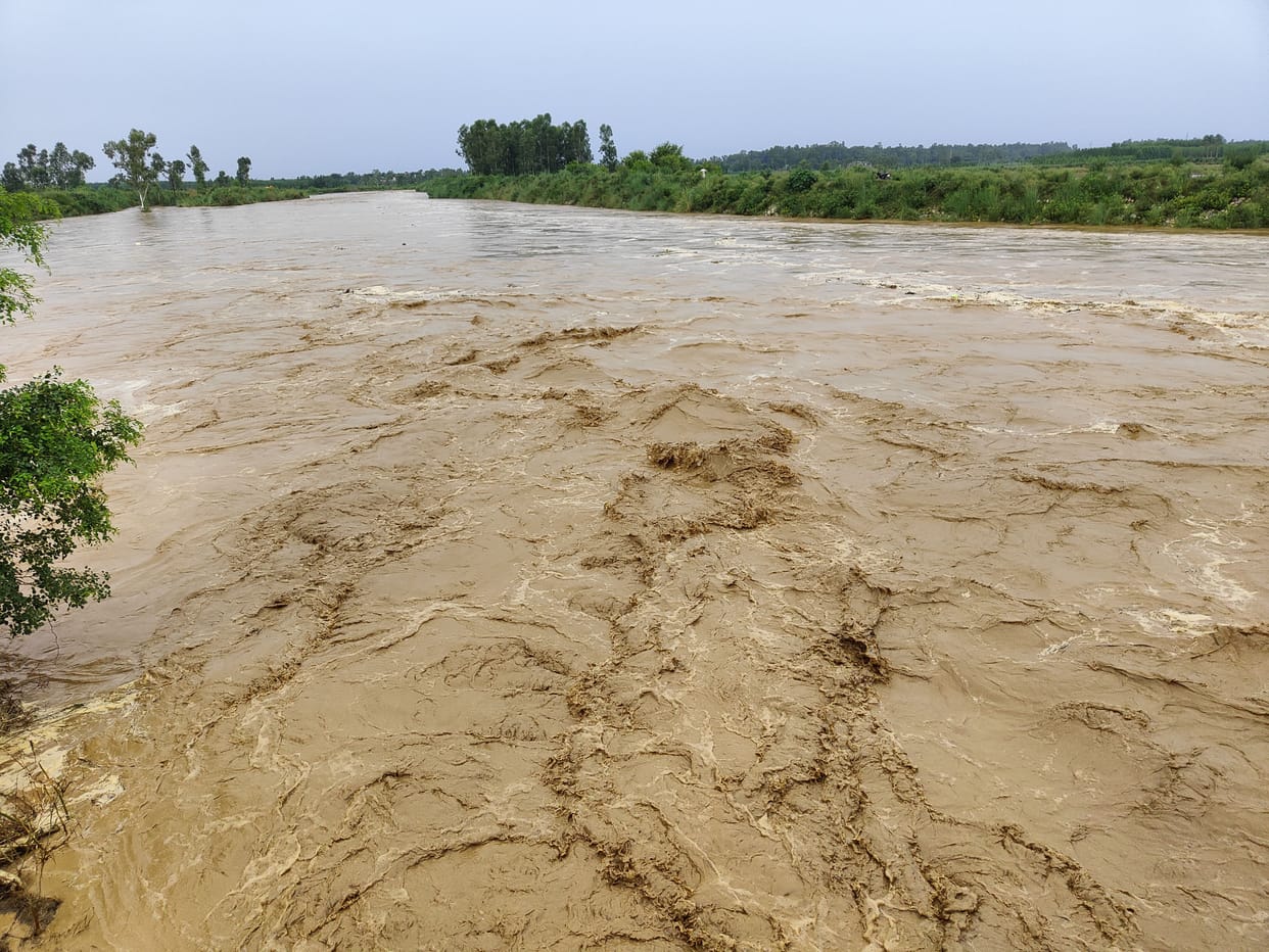 Mon river in spate due to torrential rain in the mountains