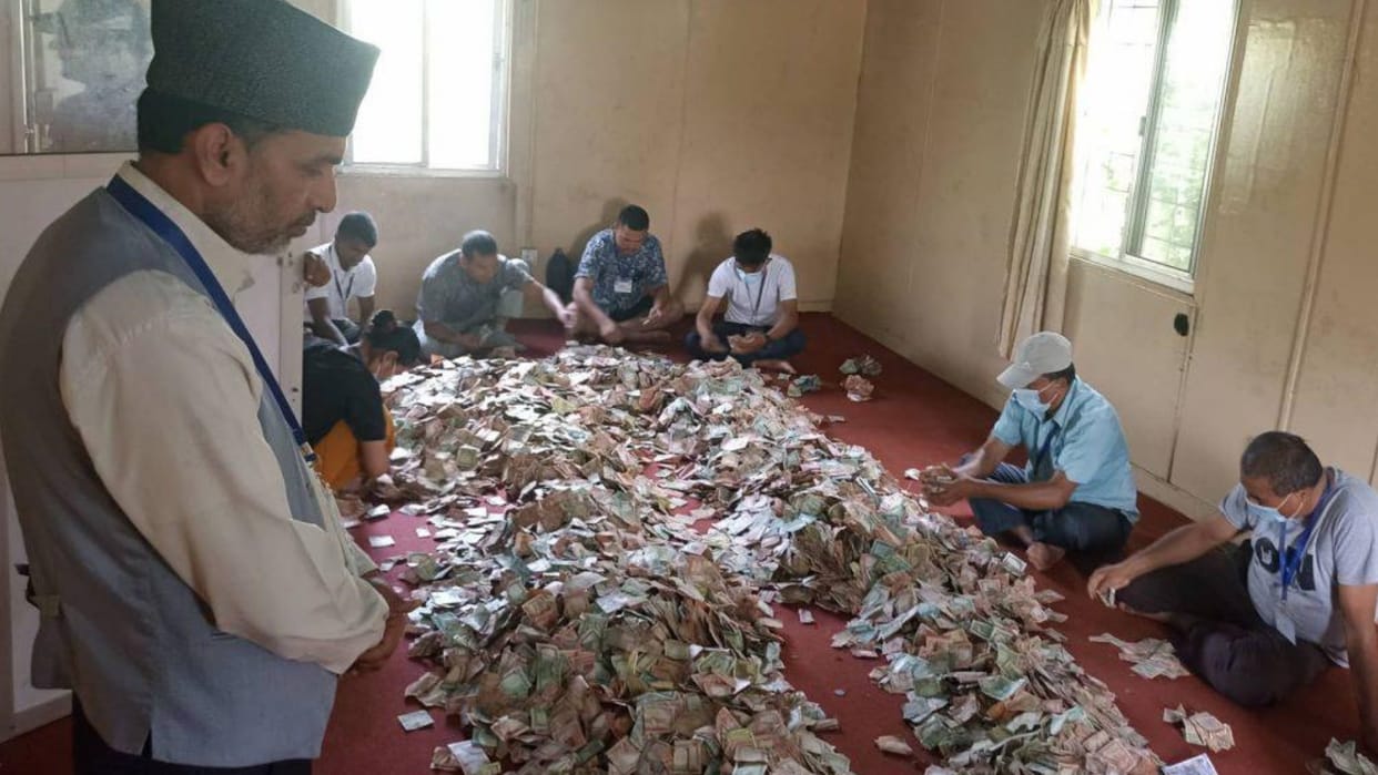 Counting started donation box in Lumbini Maya Devi temple premises